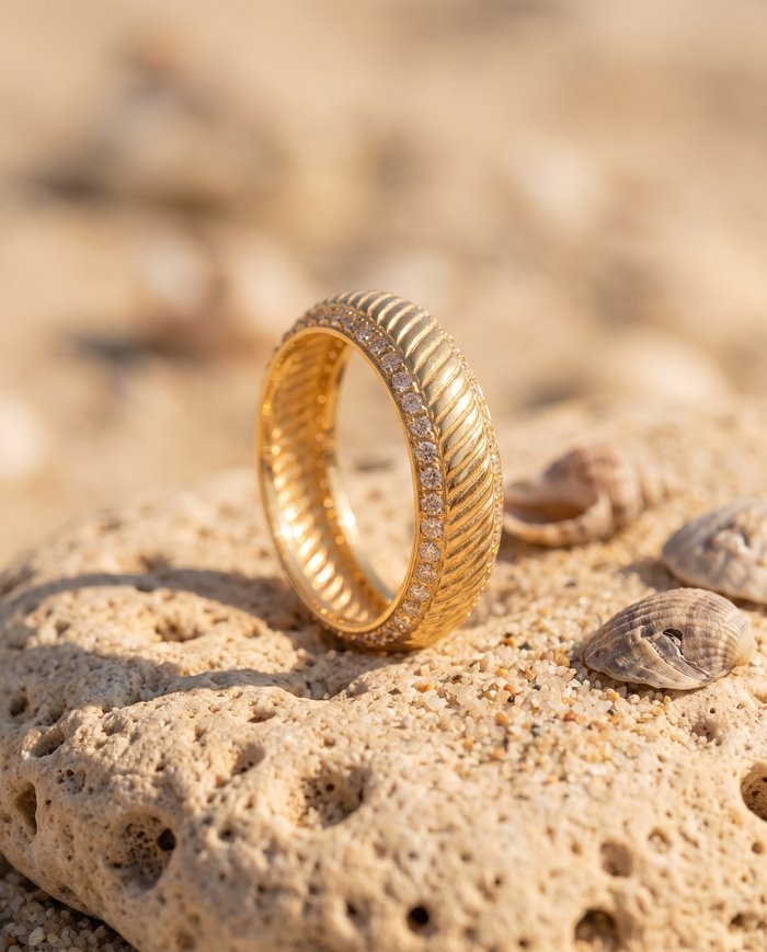 The Riviera Ring on an Aegean beach stone at golden hour