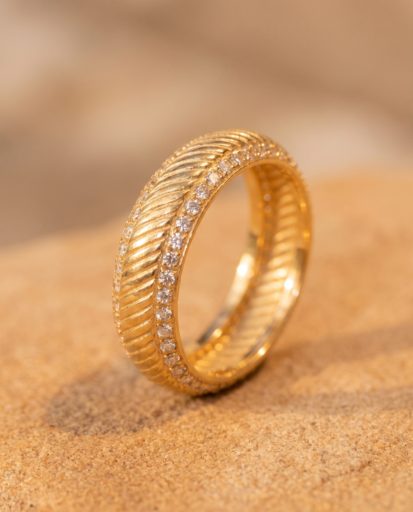 The Riviera Ring macro detail of pave diamonds and rope band