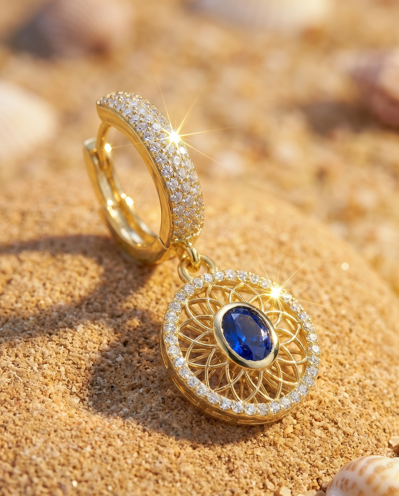 Elysian Earring macro detail of gold filigree and sapphire