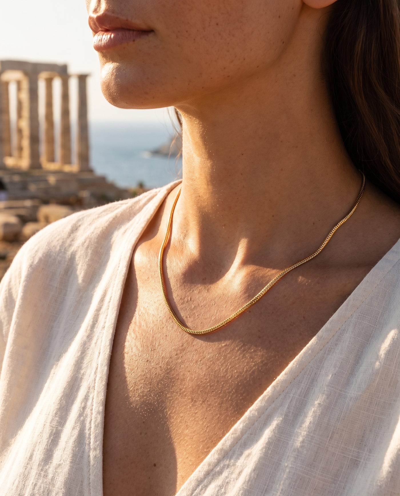 Venetian 14k Gold Chain worn at the decolletage overlooking the sea