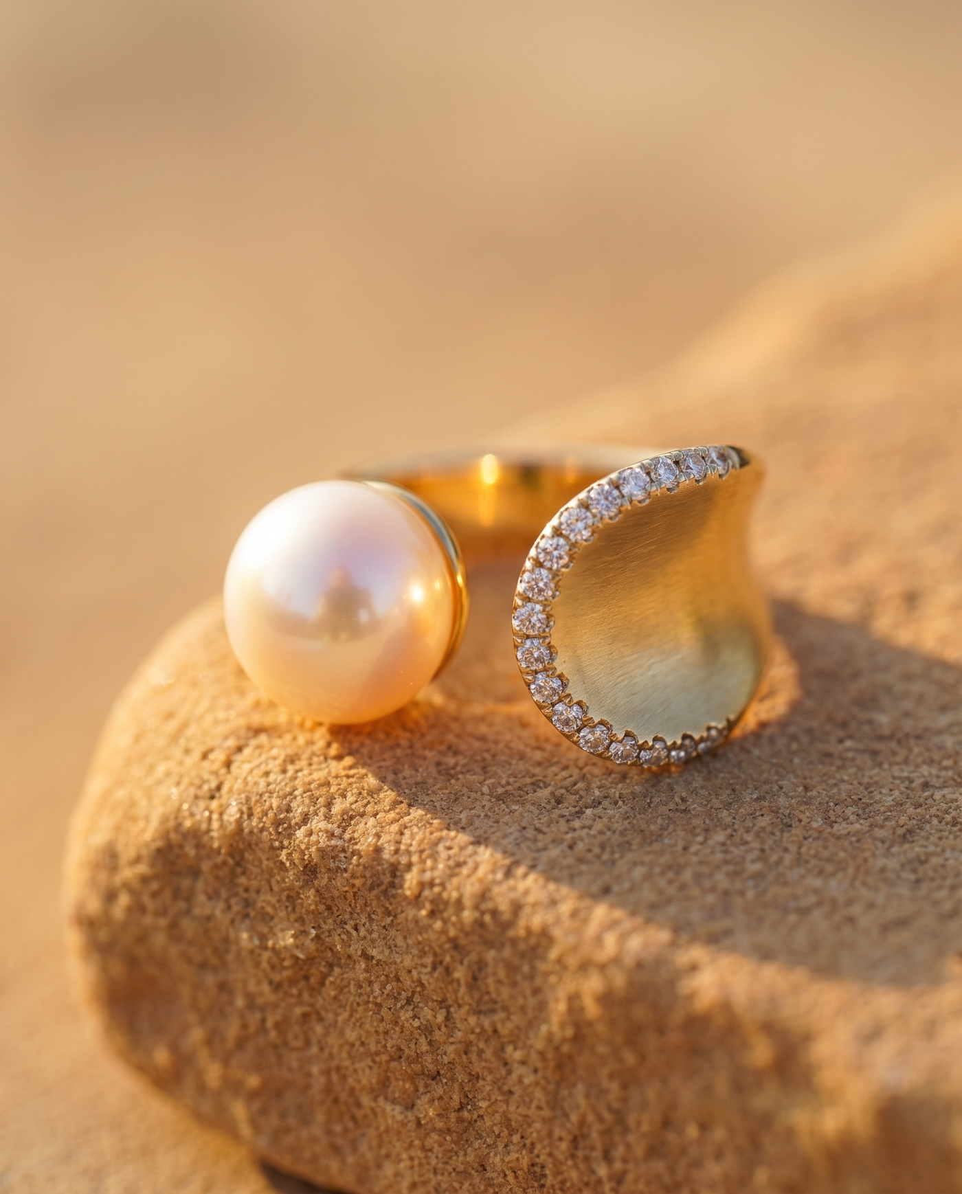 Pearl Embrace Ring macro detail of pearl and diamonds