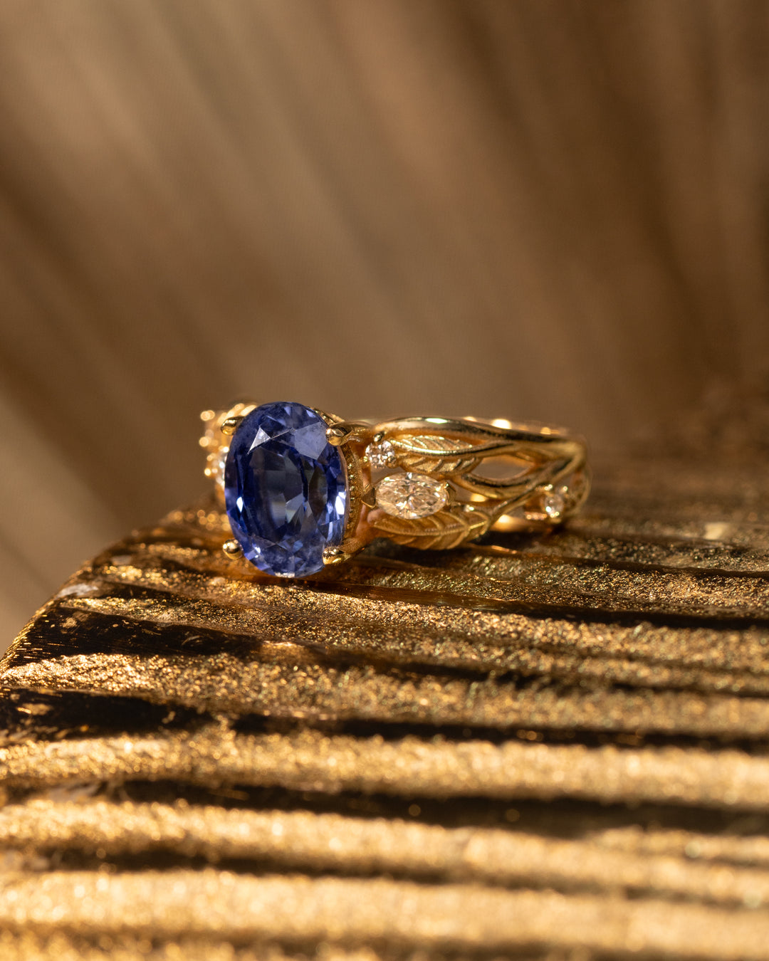 Lunaria Ring by O Collection — 14k gold leaf-engraved ring with oval sapphire and diamond accents, nature-inspired Mediterranean fine jewelry