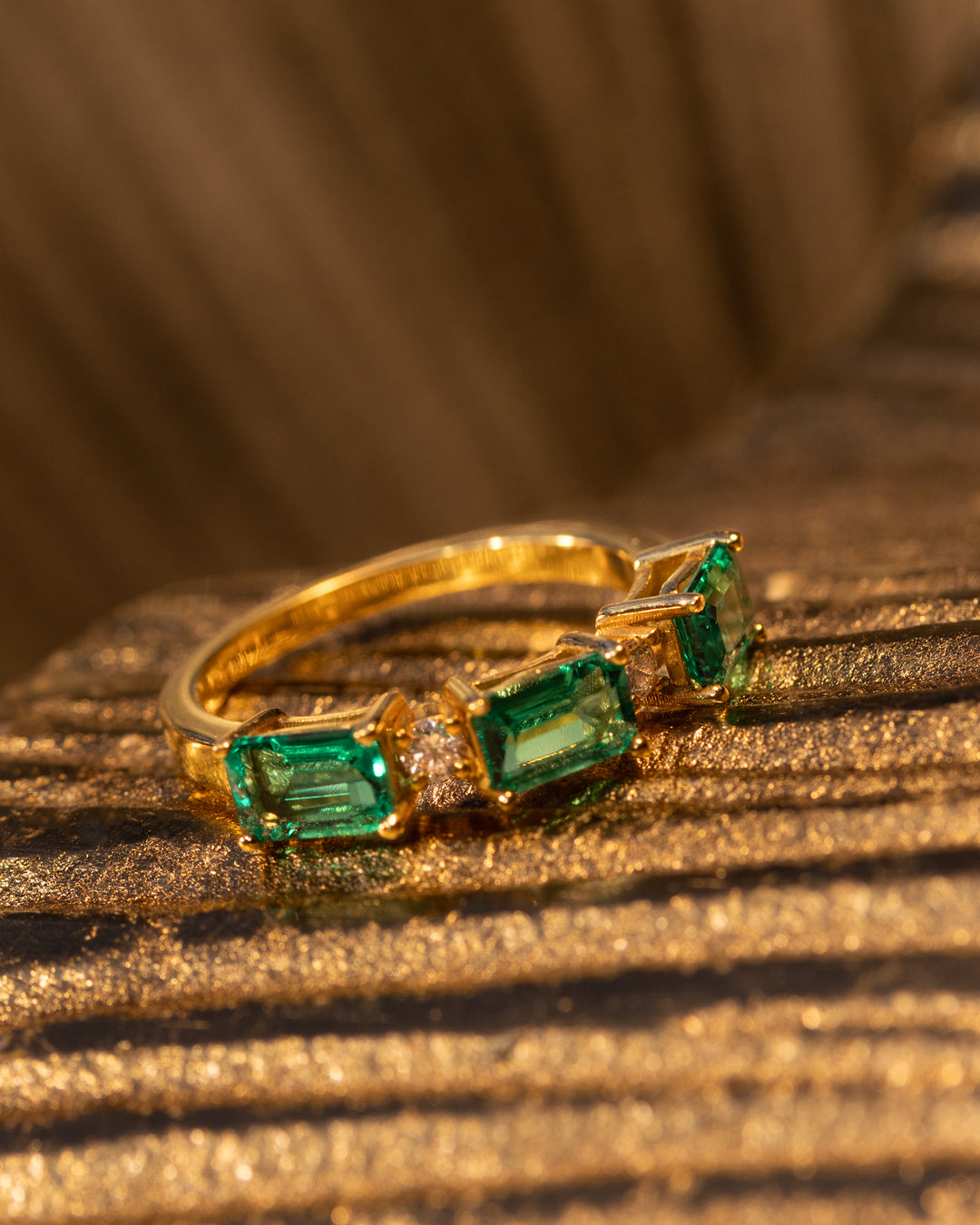 Portofino Ring in 14k gold with three emerald-cut green gemstones and diamond accents — Mediterranean-inspired fine jewelry by O Collection