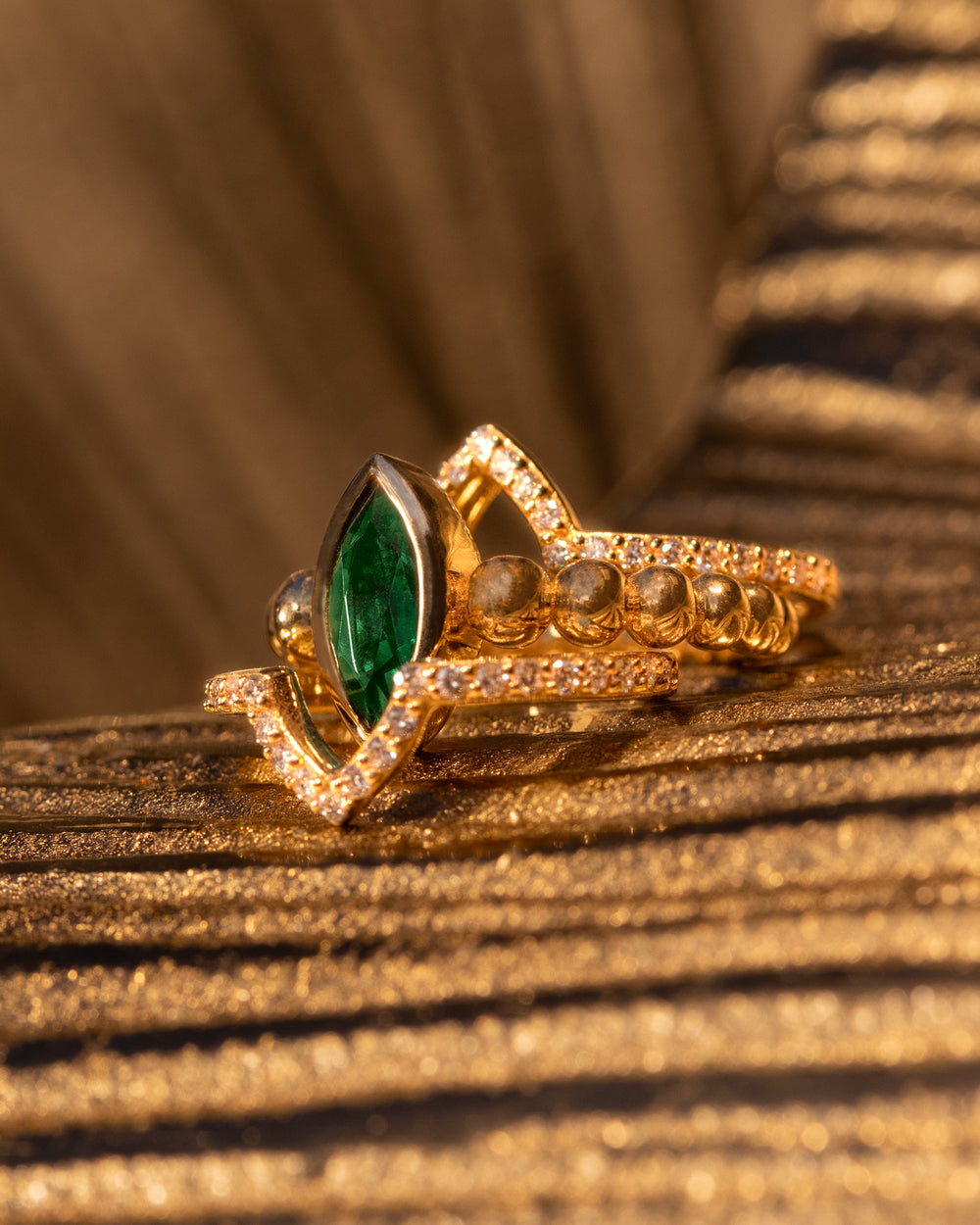 Vela Set by O Collection — 14k gold stacking ring set with marquise-cut emerald, pavé V-band, and beaded gold detail, Mediterranean-inspired fine jewelry