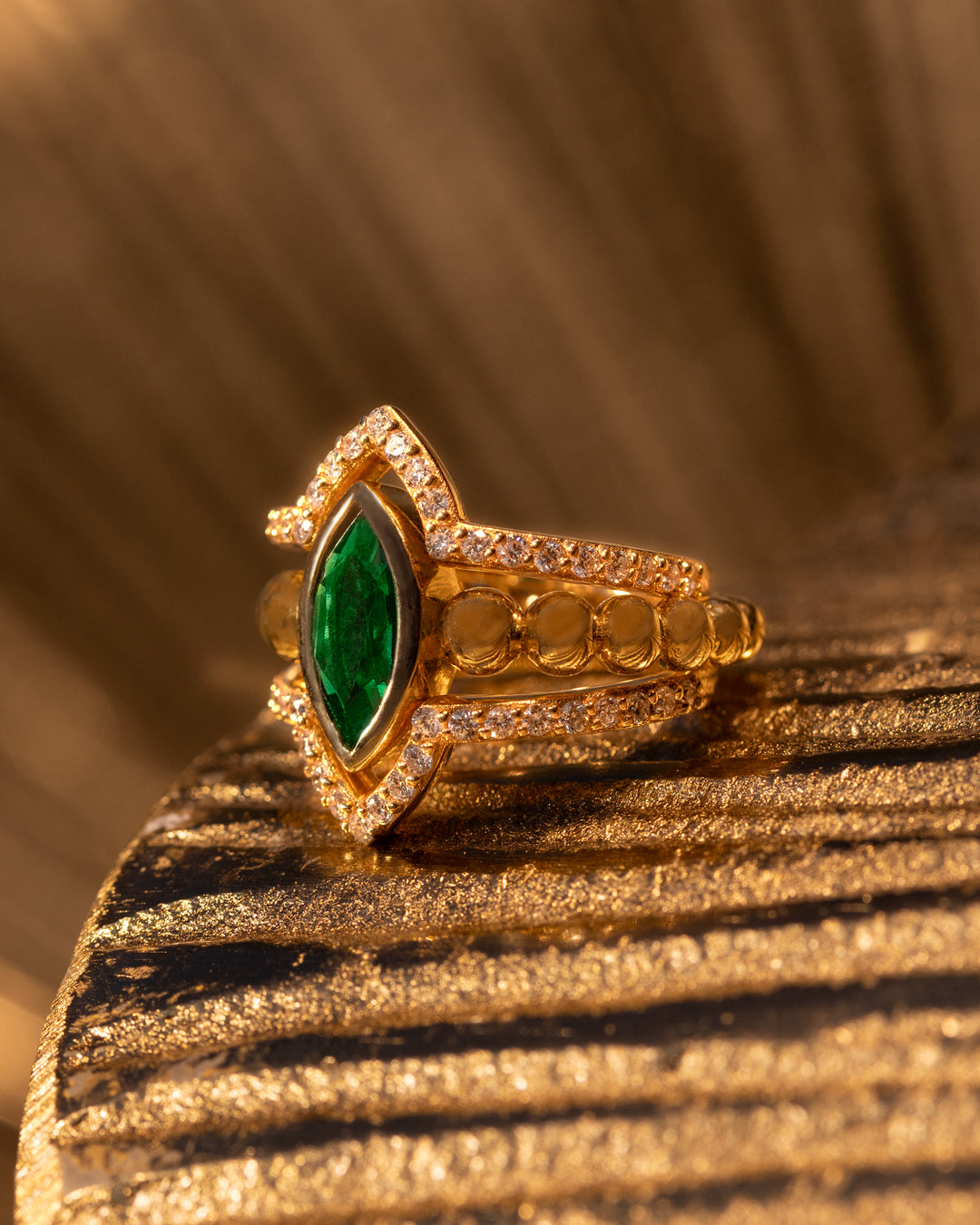 Vela Set by O Collection — 14k gold stacking ring set with marquise-cut emerald, pavé V-band, and beaded gold detail, Mediterranean-inspired fine jewelry
